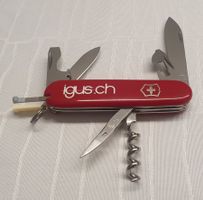 Ein Victorinox Taschenmesser / OFFICIER SUISSE mit Logo