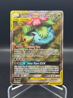 Venusaur & Snivy GX (SM 229) - Black Star Promo