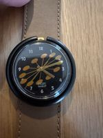 Montre Swatch Pop, bracelet cuir marron