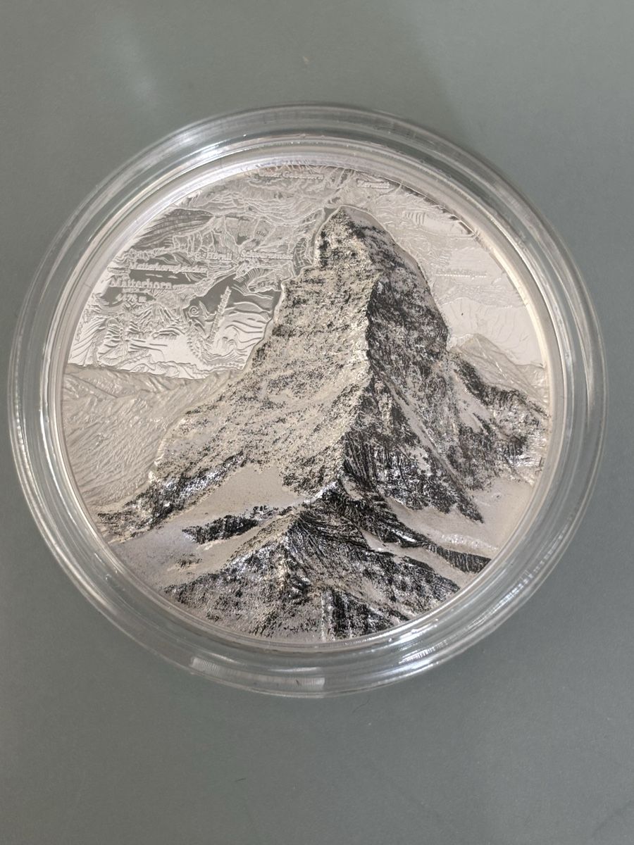 Tutti le monete: 5 Fr. 2025 Matterhorn – Nuovo e nell'imballaggio originale da Sissach venduto da Numis-Max 2