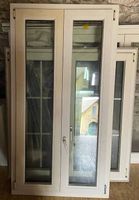 Finestra a due ante (PVC, doppio vetro)