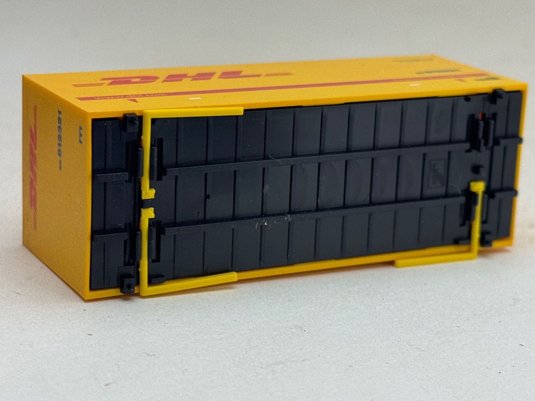 Herpa Modellini d'auto: AU- Herpa DHL Wechselpritsche – Usato da Elm venduto da Wikmtz 2