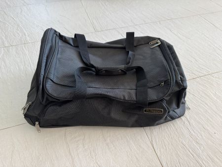 Sac de voyage Kappa noir roulant bon état