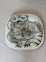 Joli plat en céramique