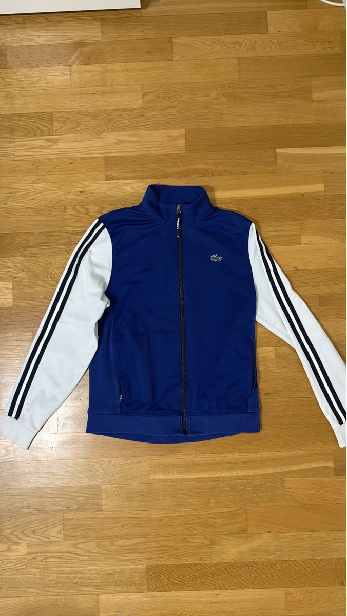 Lacoste Giacche: Veste Lacoste bleu et blanche - Taille S – Usato da Vaux-sur-Morges venduto da GothamCity
