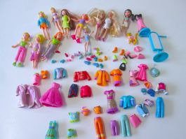 11 Plastikpuppen mit Gummikleidung