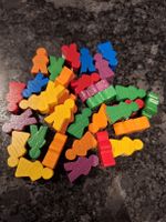 Pions de jeu en bois colorés
