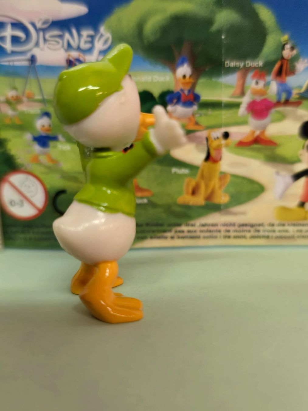 Disney Statuette: Track Disney-Minifigur grün – Nuovo e nell'imballaggio originale da Hornussen venduto da Corvette- 2