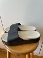 Puma Plateau Slides / Pantoletten – Schwarz/Weiss – Gr. 38