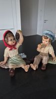 Statuettes  garçon et fille vintage en céramique.