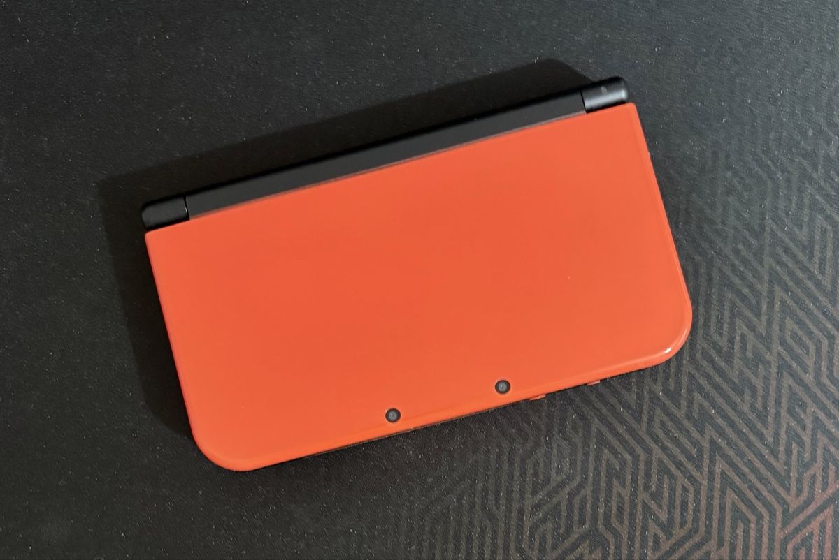 New Nintendo 3DS XL Orange/Black mit Zubehör (Gebraucht) in Arbedo für ...