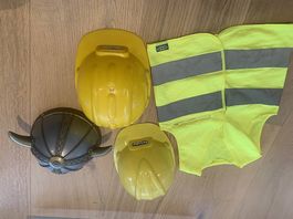 Helm und Leuchtweste