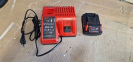 Ladegerät Milwaukee M12-18C mit Akku