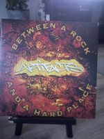 Artifacts / Between a Rock inkl 7 Inch 
