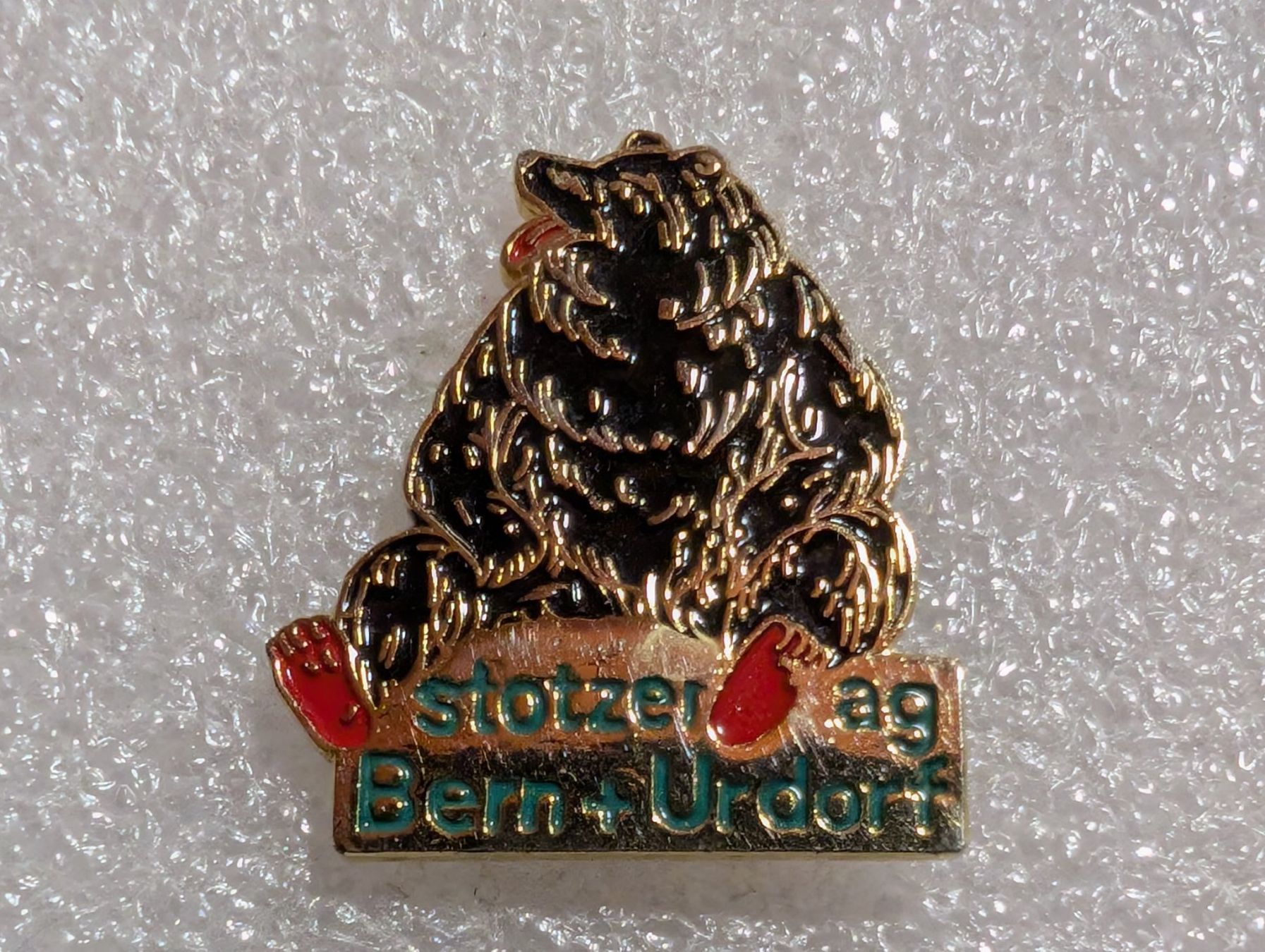Plaketten & Abzeichen: Ansteckpin 285: Stotzer AG – Gebraucht aus Oppligen von Pin-Fall-Shop