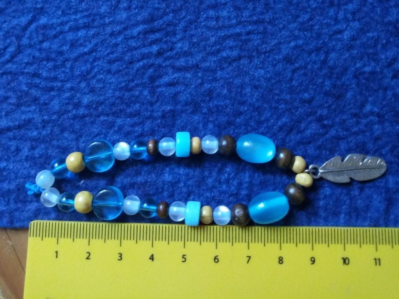 Bracciali & Braccialetti: Modeschmuck/Armband mit Federanhänger – Nuovo (secondo la descrizione) da Beckenried venduto da Havacola 2