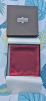 Pochette de costume en soie rouge, Patek Philippe 