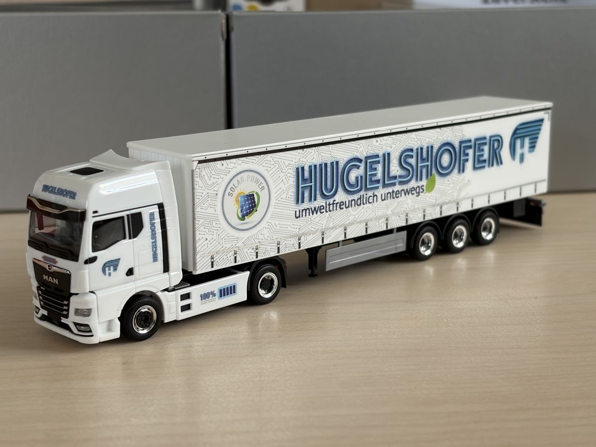 Herpa Modellini d'auto: MAN TGX GX ELECTRIC Hugelshofer – Nuovo e nell'imballaggio originale da Felben-Wellhausen venduto da Mobil01