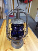 Petrol Handlampe mit blauem Glas