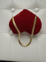 Collier comme neuf plaque or ne change pas la couleur