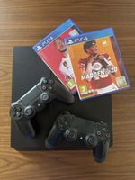 Sony PlayStation 4 Konsole mit zwei Controllern und Spielen