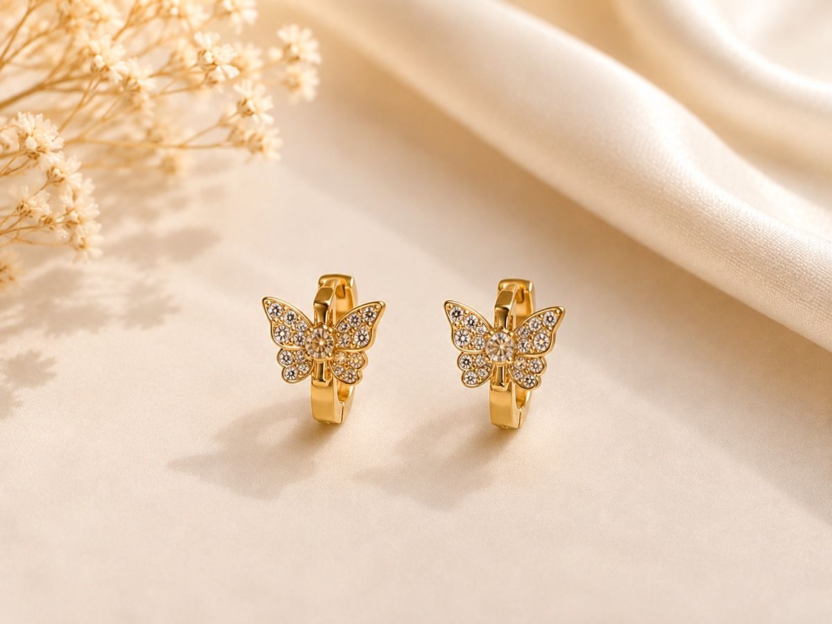 Orecchini pendenti & Orecchini a lobo: Butterfly Hoops – Nuovo e nell'imballaggio originale da Zürich venduto da MML