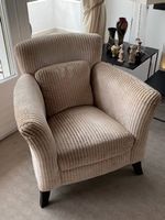 2 lounge chairs with poufee