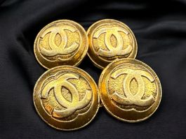 Chanel Vintage Manschettenknöpfe aus goldenem Metall.