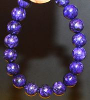 Armband A-950 – Russische Charoite 10mm Perlen – elastisch