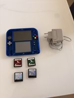 Nintendo 2ds + chargeur + 4 jeux
