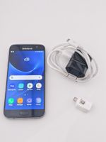 Samsung Galaxy S7 with charger