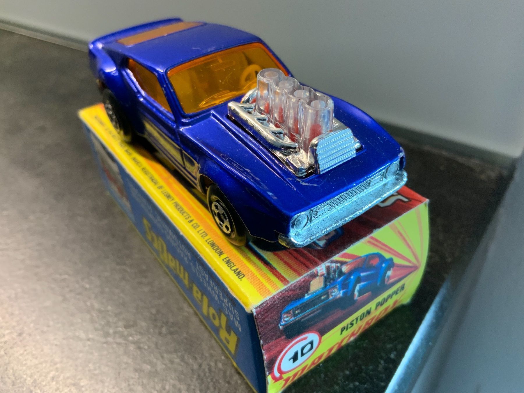 Matchbox Modellini d'auto: MATCHBOX Rola-matics Nr.10, PISTON POPPER – Nuovo e nell'imballaggio originale da Erlenbach im Simmental venduto da Model_box