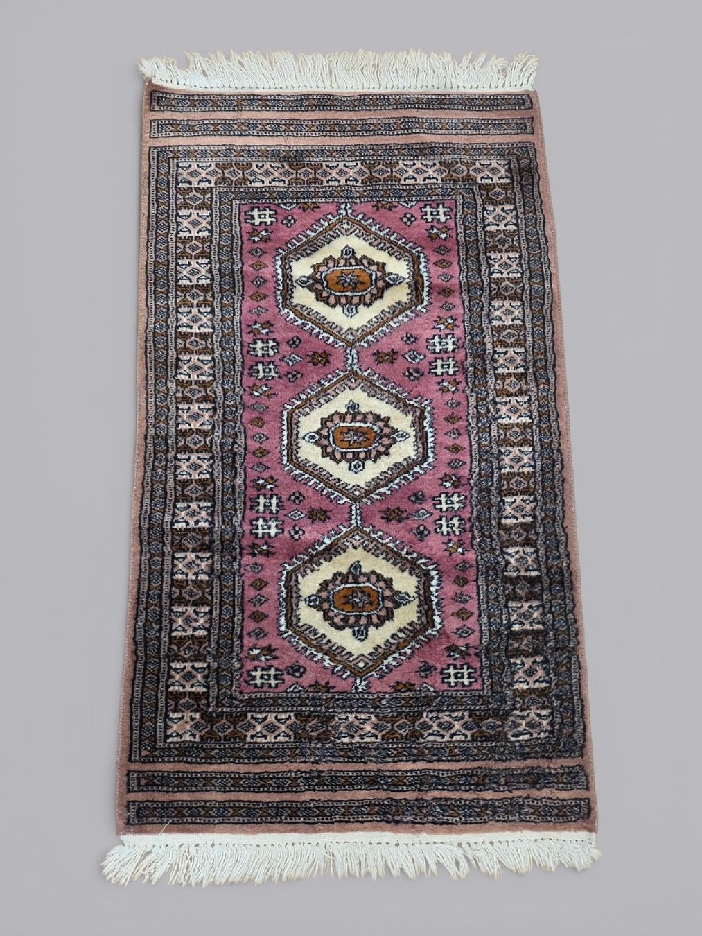 Tappeti: Rarer Perserteppich 62x117cm rosa gemustert – Usato da Rieden AG venduto da RuvensBrocki 1