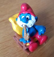 Schleich-Spielfigur: Papa Schlumpf im Schaukelstuhl