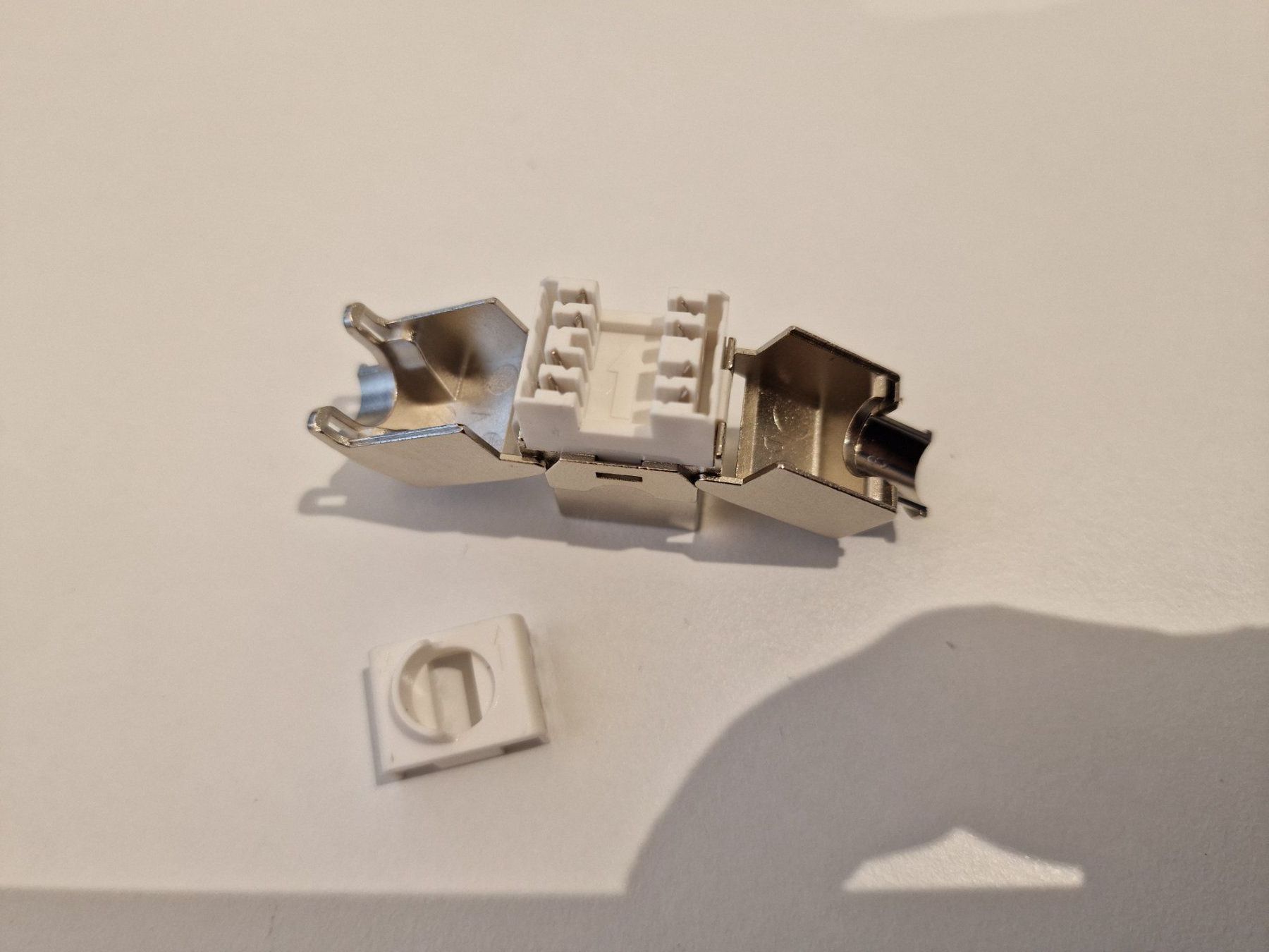 Stecker: Anschlussmodul RJ45 Cat.7, Netzwerkanschlussmodul – Neu und originalverpackt aus Buchrain von Sssschaller 1