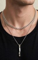 Collana doppia catena colore argento con pendente nuovo