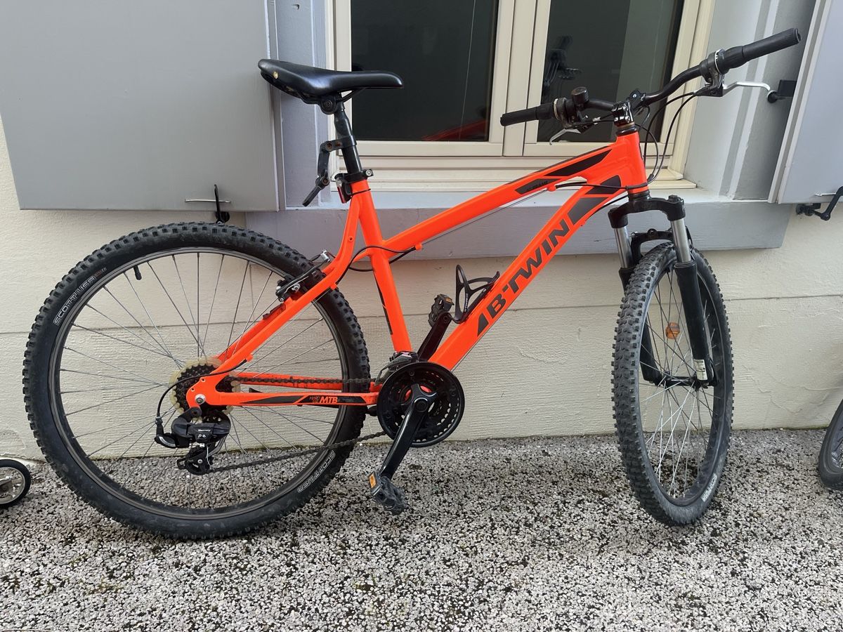 Biciclette: B'Twin Rockrider orange MTB Velo – Difettoso da Muttenz venduto da emun