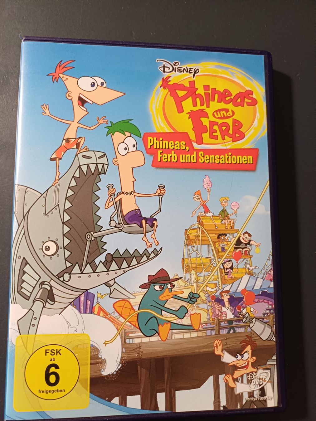 Tutti i DVDs: DVD Phineas & Ferb: Sensationen – Usato da Zürich venduto da Atad