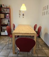 Grosser Esszimmertisch aus Holz