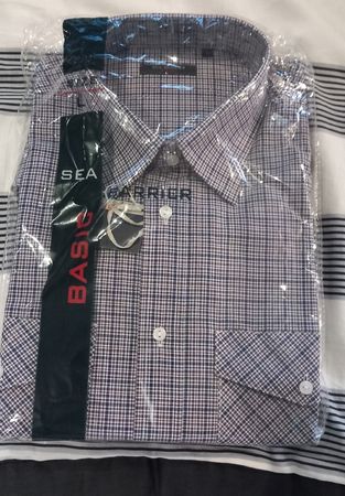 Chemise a carreaux. manches courtes L