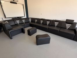 Schwarzes Ecksofa aus Leder mit Ottomanen, Top Zustand