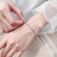 silber armkette mit schmitterling