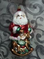 grosser Weihnachtsmann mit Schaukelpferd Christbaumschmuck