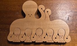 Holzpuzzle Tintenfisch von Naef Design Sabu Oguro