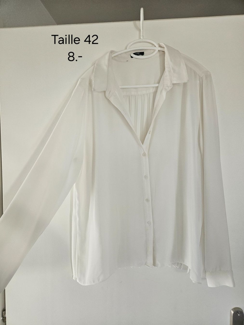 Camicette: Chemisier blanc t.42 – Usato da Vétroz venduto da sas_yln5