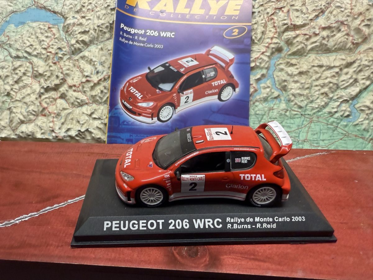 Peugeot Modellini d'auto: Peugeot 206 WRC 2003.  1/43 – Usato da Versoix venduto da Jeannot57