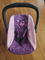 Puppentrage Babyschale lila/rosa, guter Zustand
