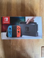 Nintendo Switch   bon état  Boîte incluse