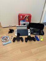 Nintendo Switch OLED in sehr guter Zustand + Spiel