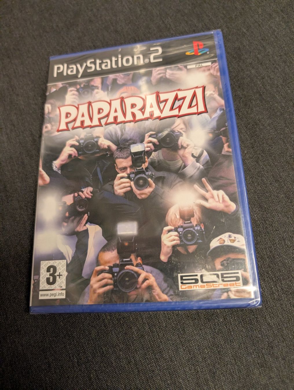 Jeux: Paparazzi Sony playstation 2 SEALED – Neuf avec emballage d'origine à Giubiasco par Ticinerd